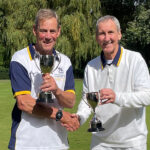 Finals Weekend 2024 - Handicap Championship finalists celebrate with their cups and a handshake