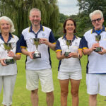 Finals Weekend 2024 - Two Wood Pairs Championship finalists celebrate holding their cups